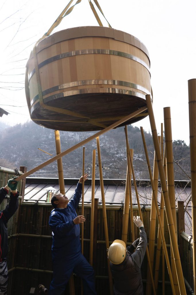 The workers had to be very careful when installing the new tub